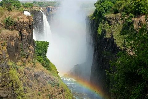 Illustrative photo: Victoria Falls and a rainbow rising through the spray