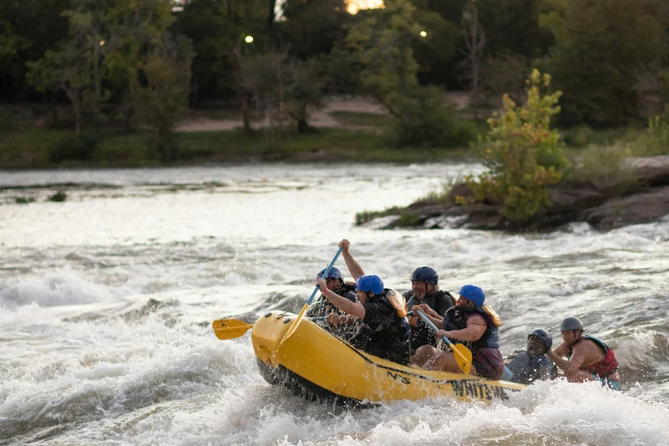 Illustrative photo: Rafters paddling through white-water rapids